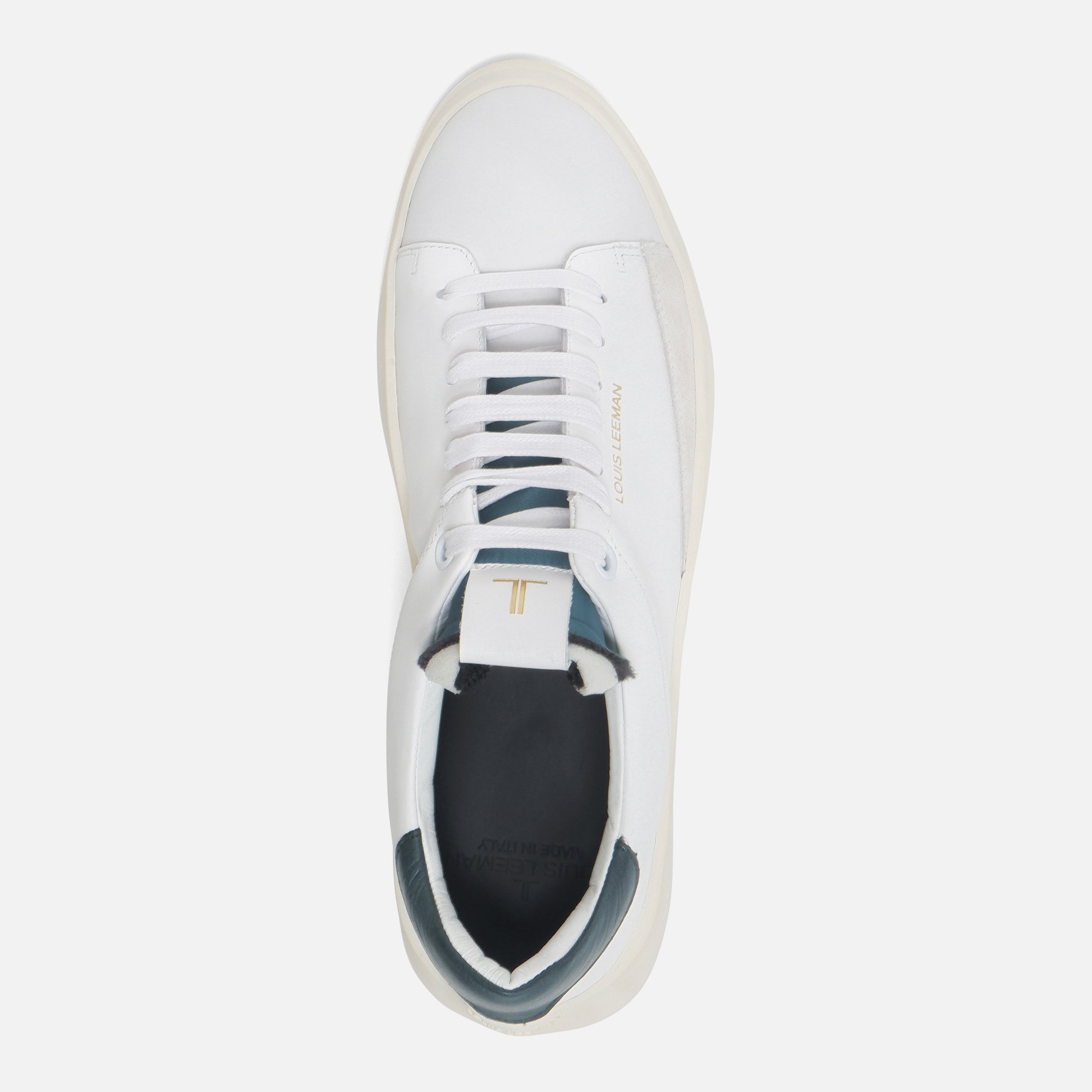 White sneakers with green back hot sale
